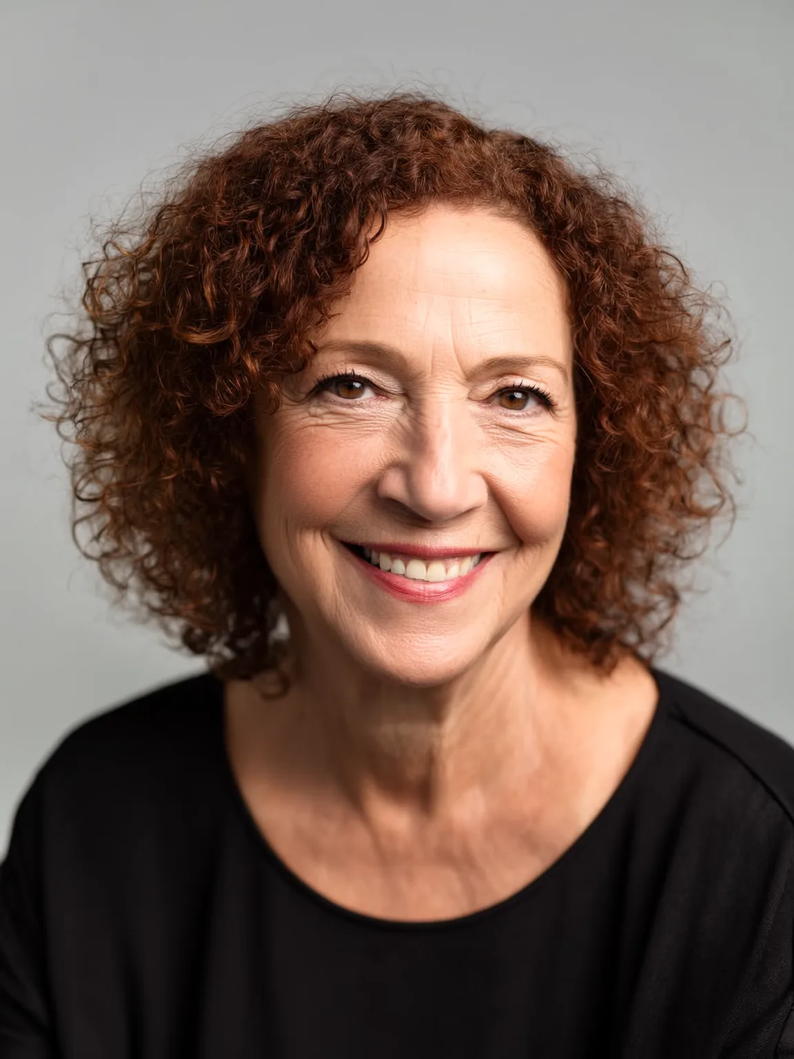 Rich Auburn Voluminous Chin-Length Curly Bob